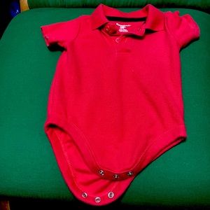 Red collared, two button onesie.